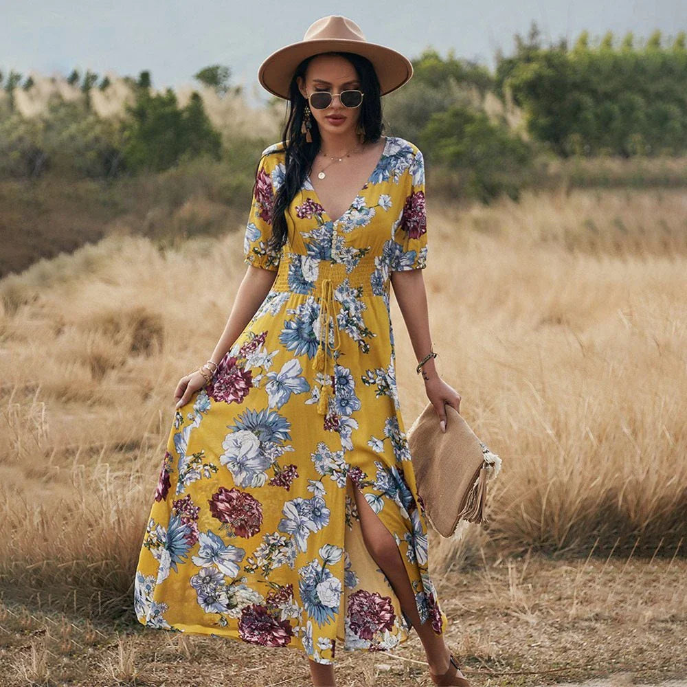 Elegant summer maxi dress with vibrant print, flattering A-line silhouette, and comfortable natural fiber blend