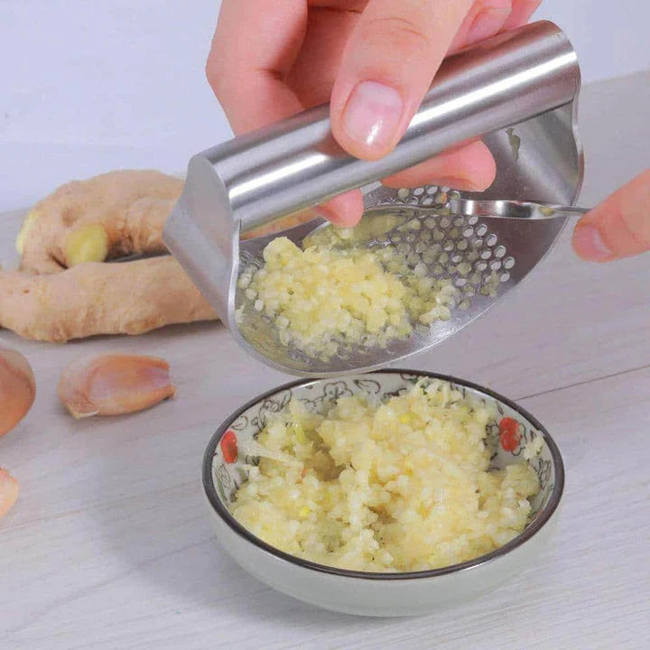 Ergonomic stainless steel garlic press, a must-have kitchen tool for Kiwi home chefs