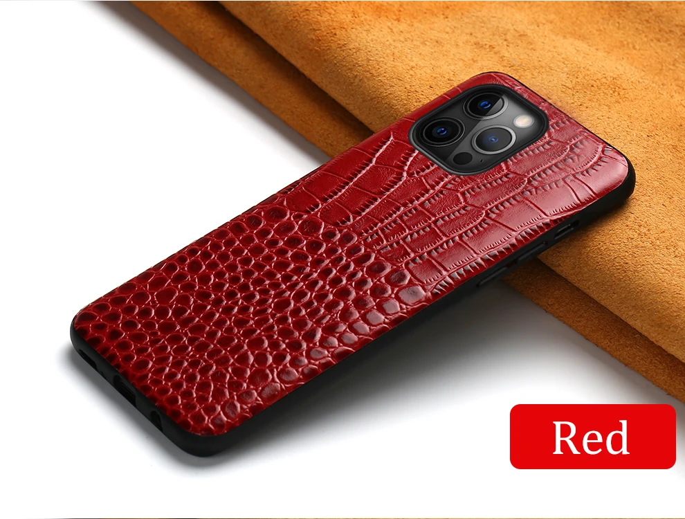 Durable leather iPhone case with shock-absorbing frame, elevated camera cover, and oleophobic coating for premium protection