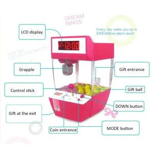 Kiwi-made coin-operated claw machine and alarm clock with precision controls and vibrant LED display