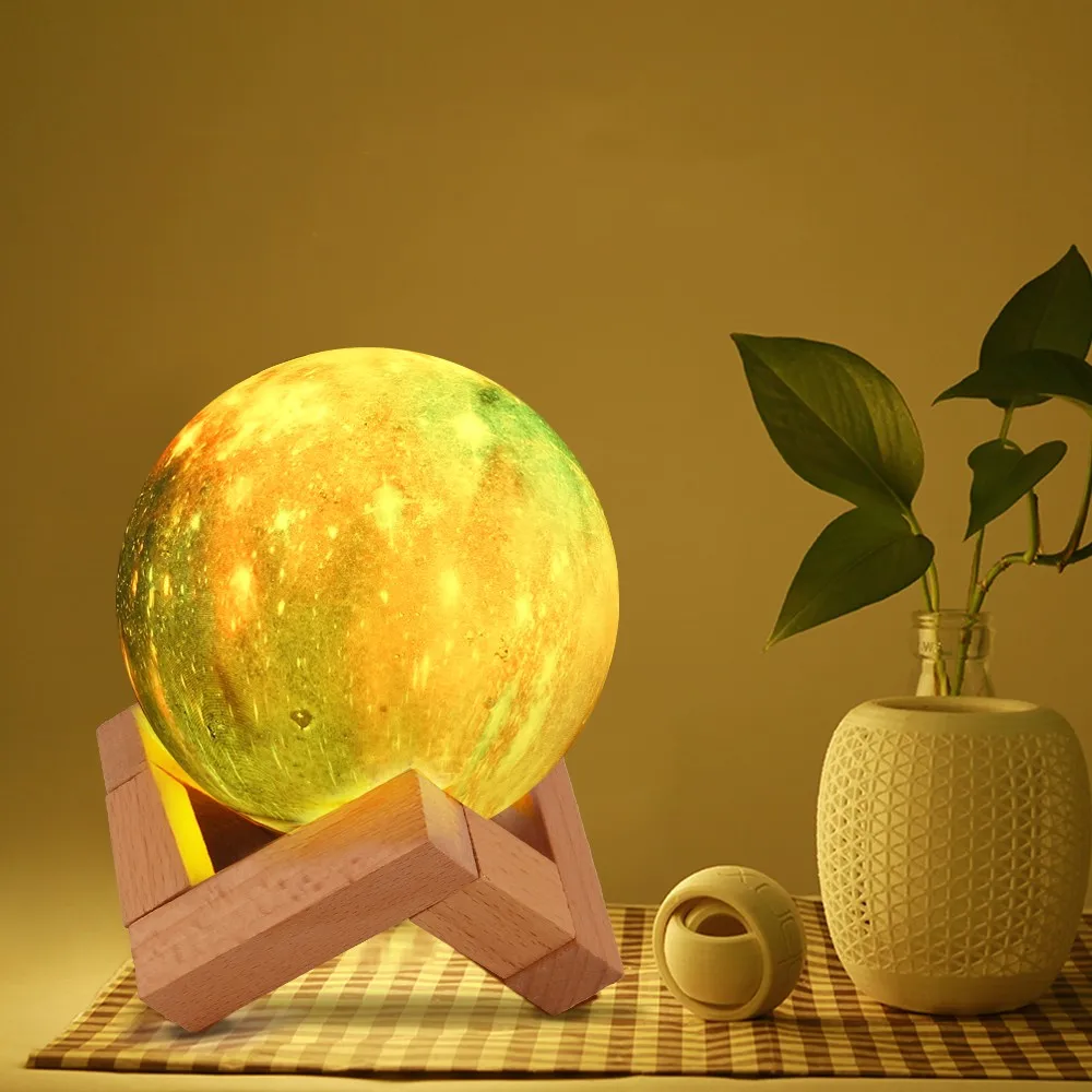 A 3D printed moon lamp with 16 colour options and a remote control, creating a stunning celestial ambiance in a living room.