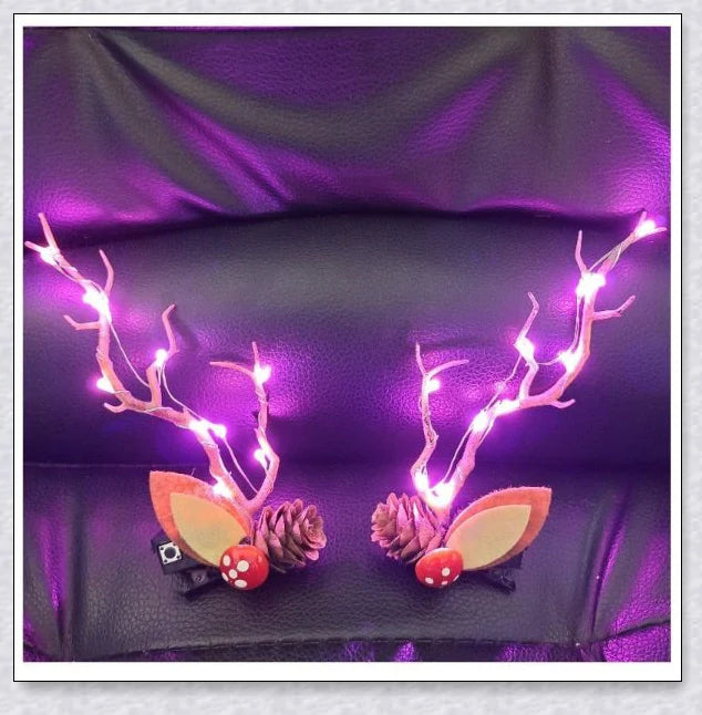 Festive Blinking Hair Clip with twinkling LED lights and adorable antler design for Christmas celebrations