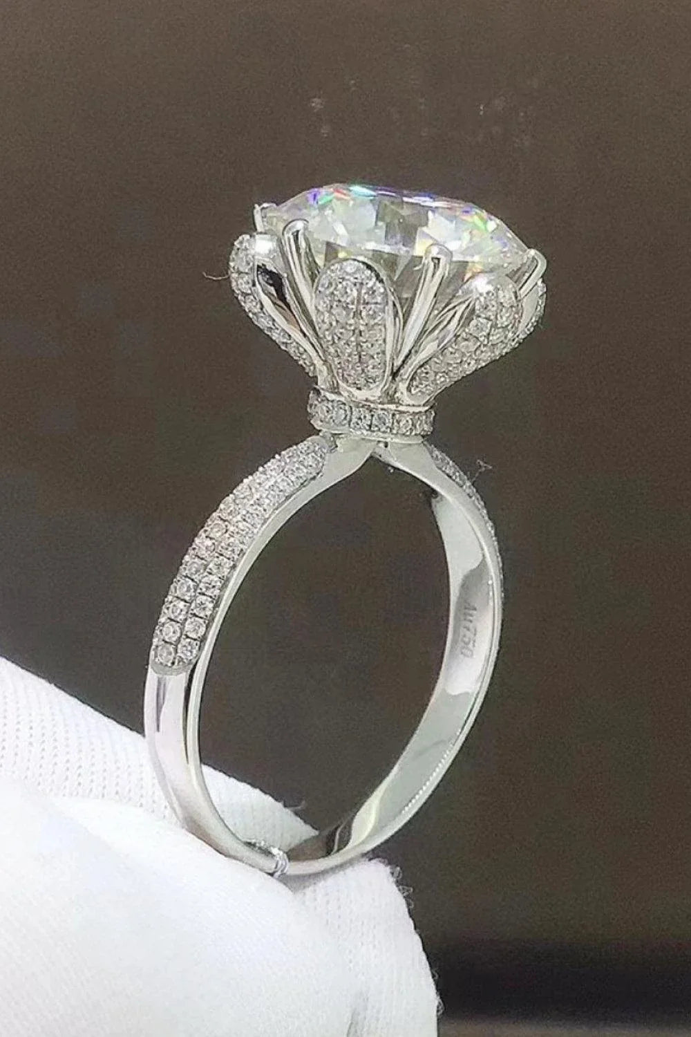 Exquisite 5 carat moissanite ring with contemporary geometric design, crafted in premium 925 sterling silver with sparkling zircon accent stones.