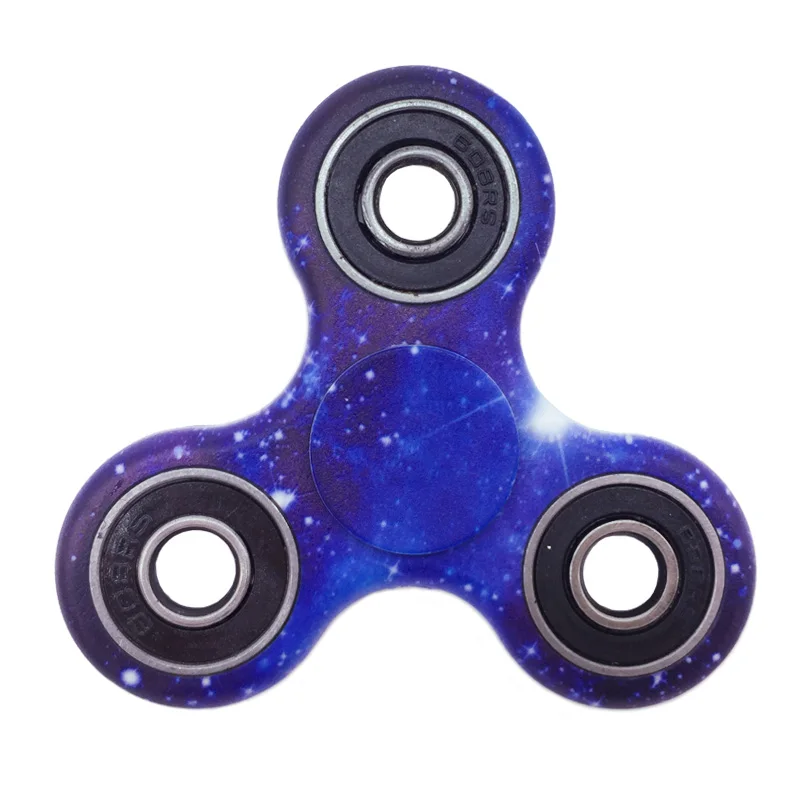 A premium designer spinner in various colors, designed to provide stress relief and improve focus for Kiwis