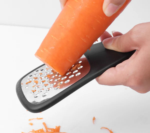 A set of 6 modern and efficient kitchen gadgets, including slicers, peelers, and measuring tools, on a white background.