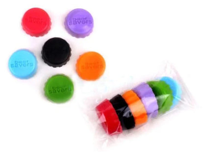 Assortment of colourful silicone wine bottle caps in red, blue, green, yellow, purple, and pink shades, designed to preserve freshness and add a touch of Kiwi style to your home.