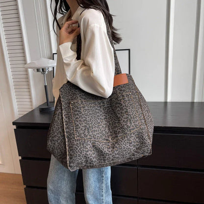 Oversized leopard print canvas shoulder bag with ample storage and stylish design, perfect for Kiwi women