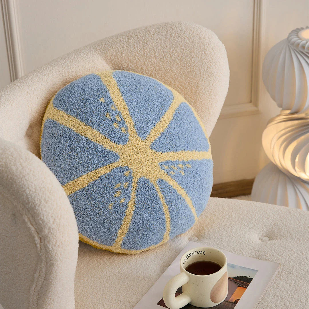 A vibrant, lemon-themed throw pillow with a crocheted pattern and soft, comfortable microfiber fabric.