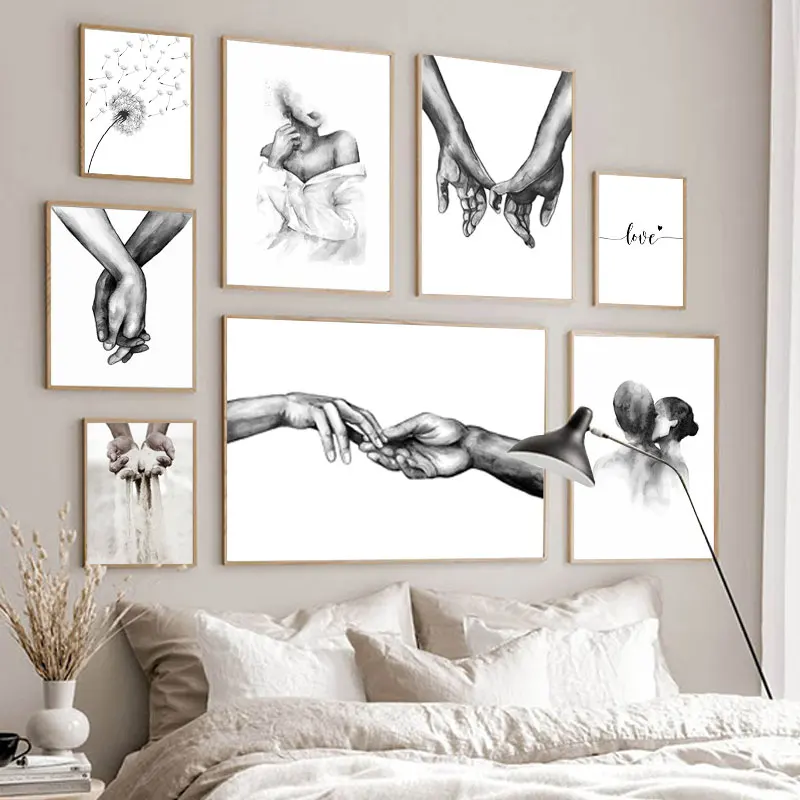 A black and white canvas painting depicting a couple holding hands, perfect for adding a romantic touch to your New Zealand home