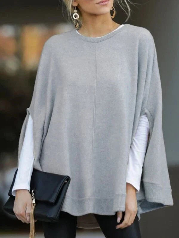 Cosy and relaxed bat-sleeve knit top poncho in a classic plain design, perfect for everyday Kiwi style