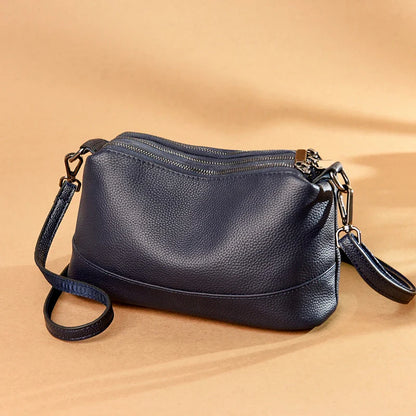 Premium cowhide shoulder bag in a variety of colors, featuring a stylish urban-inspired design, roomy main compartment, and adjustable strap for Kiwi women.