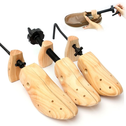 Adjustable wooden shoe stretcher expanding a pair of shoes, made with high-quality New Zealand timber