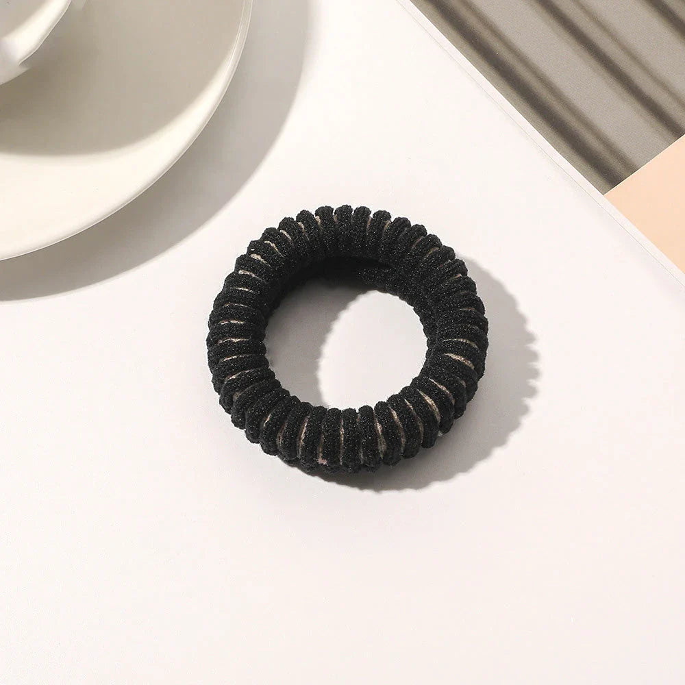 Stylish knitted lattice hair scrunchies in a black and white striped pattern, perfect for Kiwi women's hair accessories