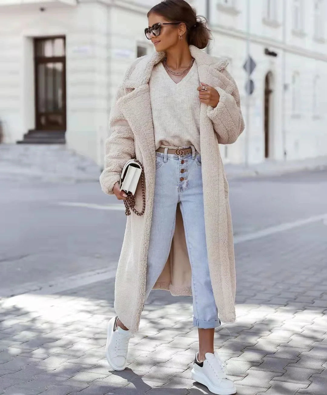 Stylish women's long fur coat with an irregular single-breasted design, available in a range of classic Kiwi-inspired colours