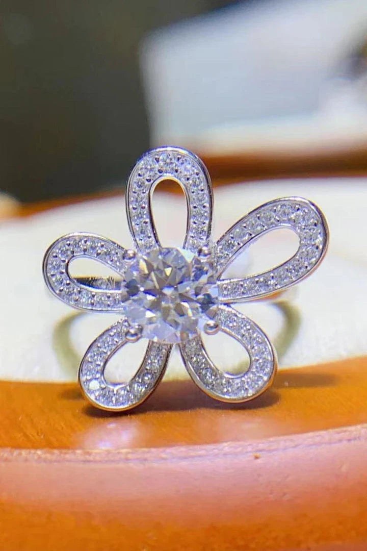 Moissanite flower-shaped open ring with 1 carat center stone and platinum plating