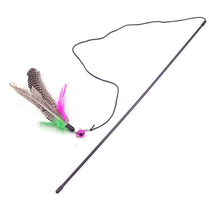 The Interactive Cat Toy Feather with a green feather and sturdy plastic ball, designed to engage cats in energetic play and satisfy their natural hunting behaviours.