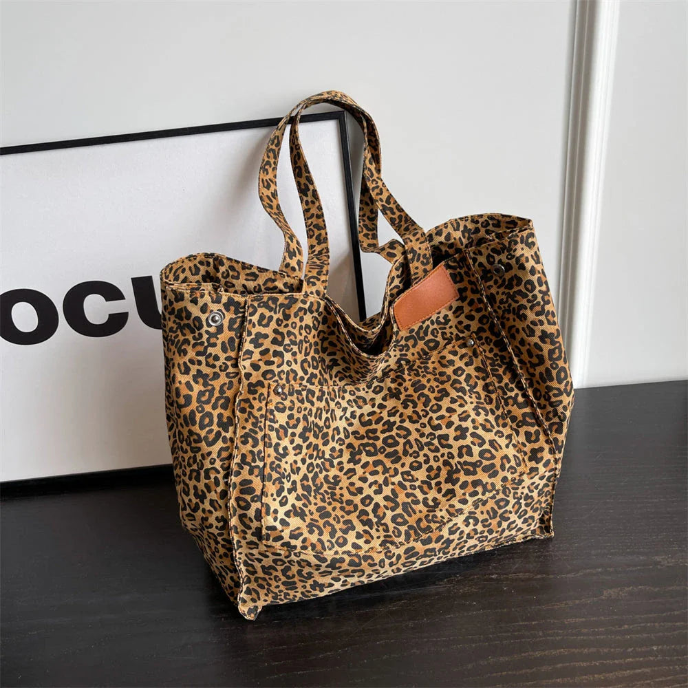 Oversized leopard print canvas shoulder bag with ample storage and stylish design, perfect for Kiwi women
