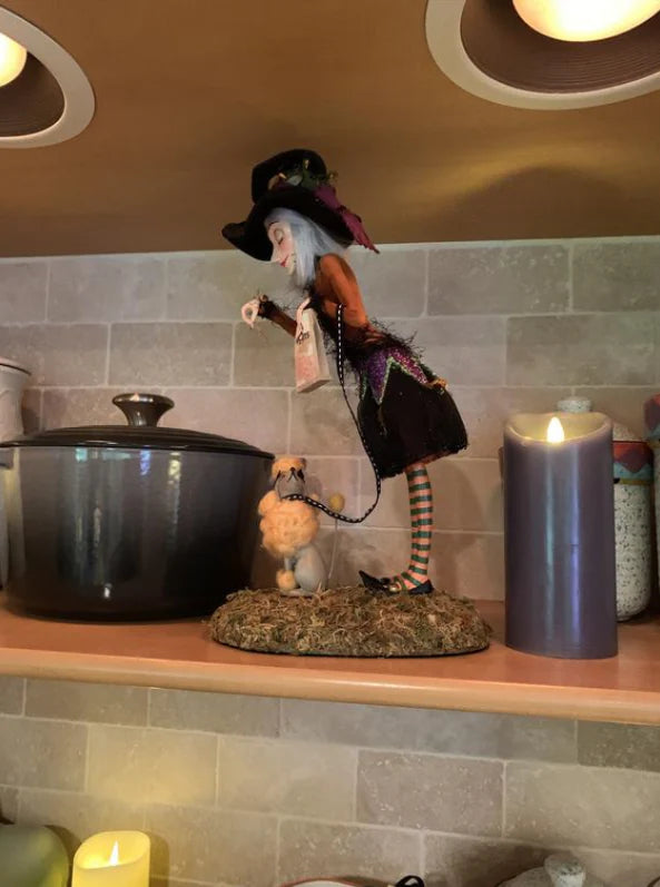 Enchanting Witch Figurine, a captivating tabletop decoration for Kiwi Halloween celebrations