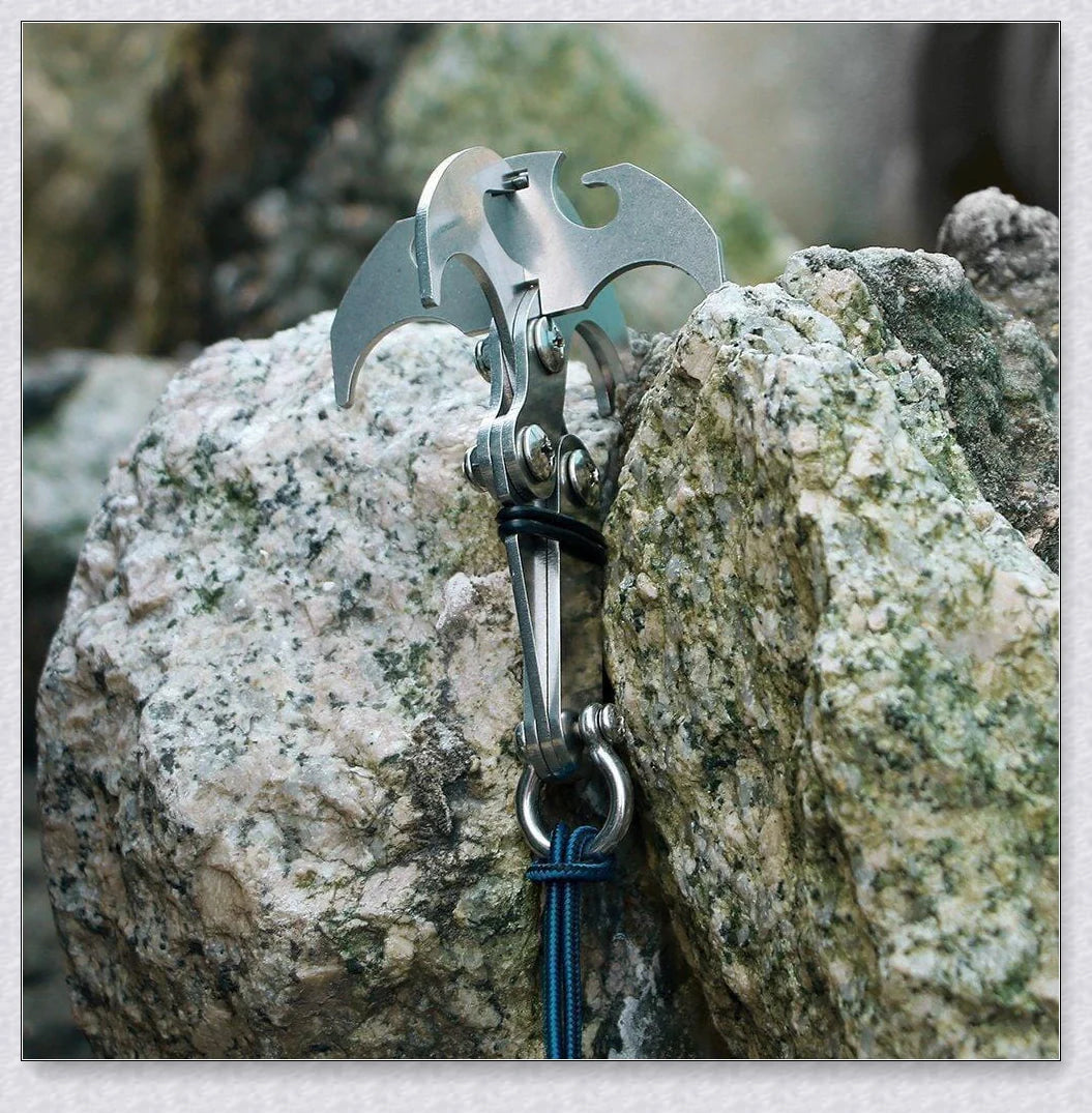 Sturdy stainless steel grappling hook with gravity-powered jaws, designed for outdoor adventures and survival in New Zealand