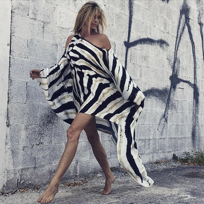 Stylish inclined shoulder printed dress set with a flowing, large swing-style skirt and vibrant patterns