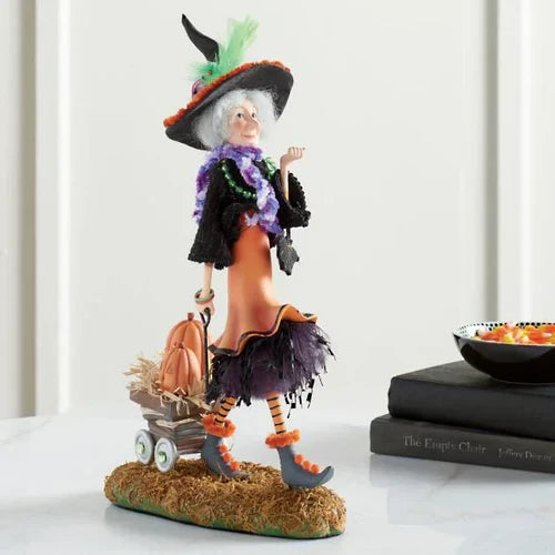 Enchanting Witch Figurine, a captivating tabletop decoration for Kiwi Halloween celebrations