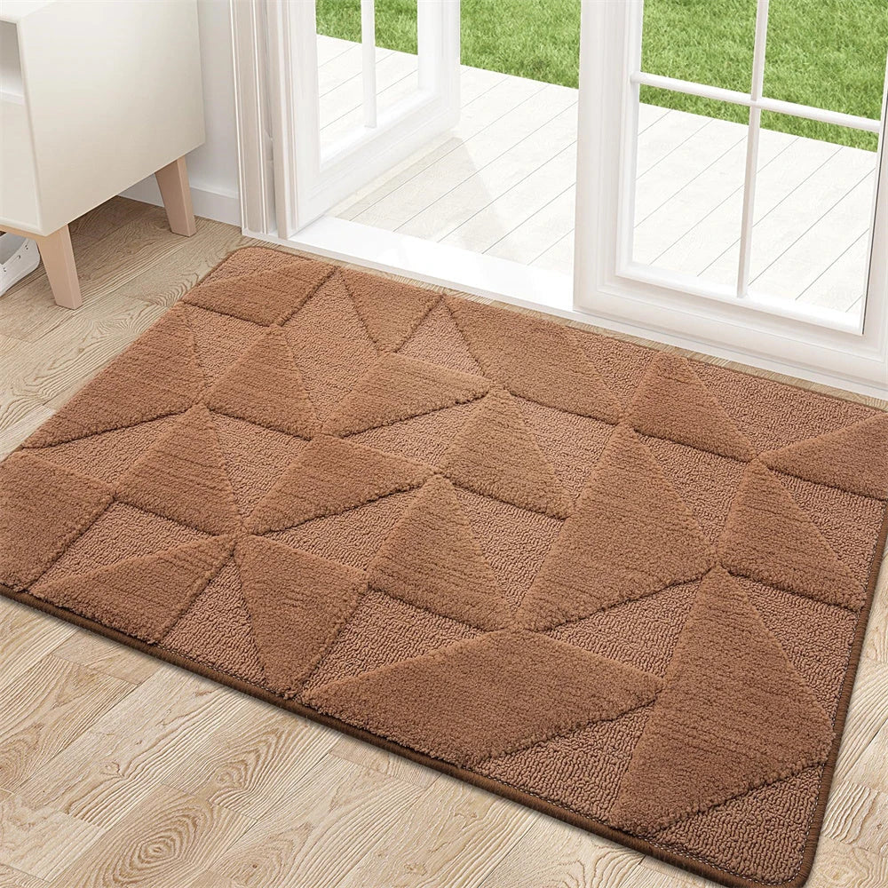 Geometric non-slip microfibre door mat in various sizes, featuring an elegant pattern and durable construction for a clean, stylish entryway.