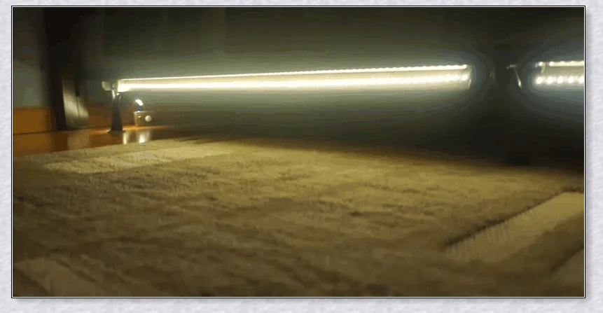 Cosy under-bed motion-activated LED light strip provides soft, guiding illumination in the dark