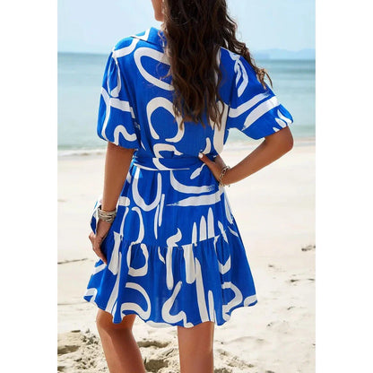 Elegant women's printed dress with short sleeves, ideal for spring and summer in New Zealand