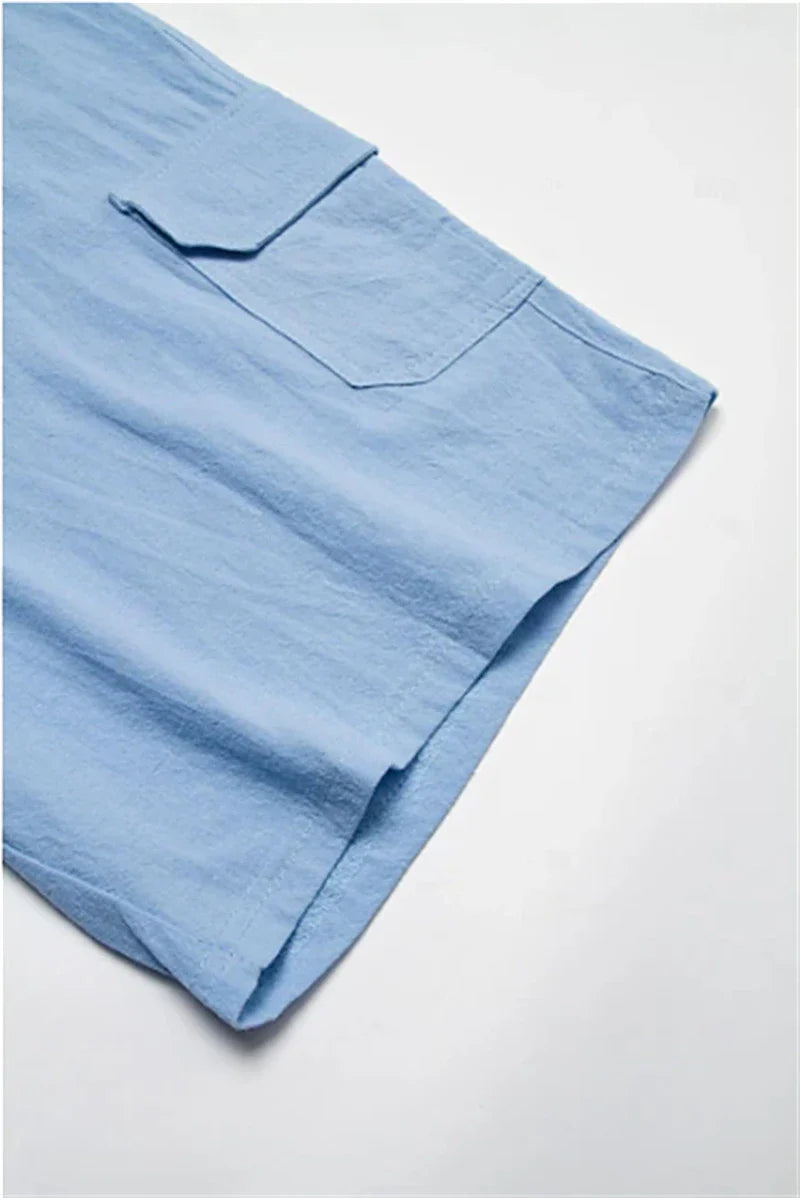 Cotton linen shorts with drawstring elastic waist and straight leg, available in various colors for casual summer style