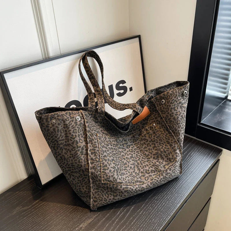 Oversized leopard print canvas shoulder bag with ample storage and stylish design, perfect for Kiwi women
