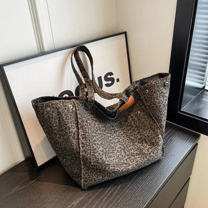 Oversized leopard print canvas shoulder bag with ample storage and stylish design, perfect for Kiwi women