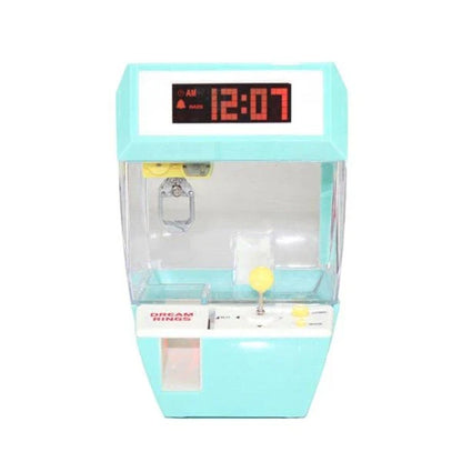 Kiwi-made coin-operated claw machine and alarm clock with precision controls and vibrant LED display