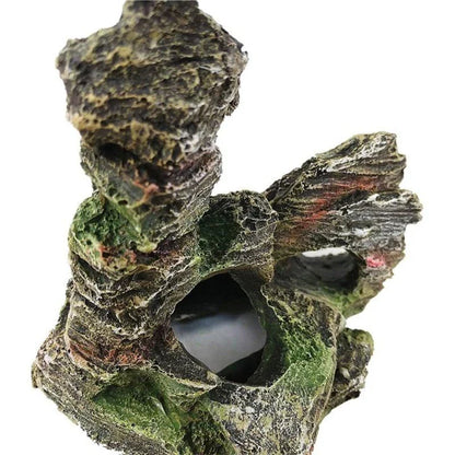 A decorative cave structure made of resin, designed to enhance the aesthetics and provide a safe haven for fish in an aquarium