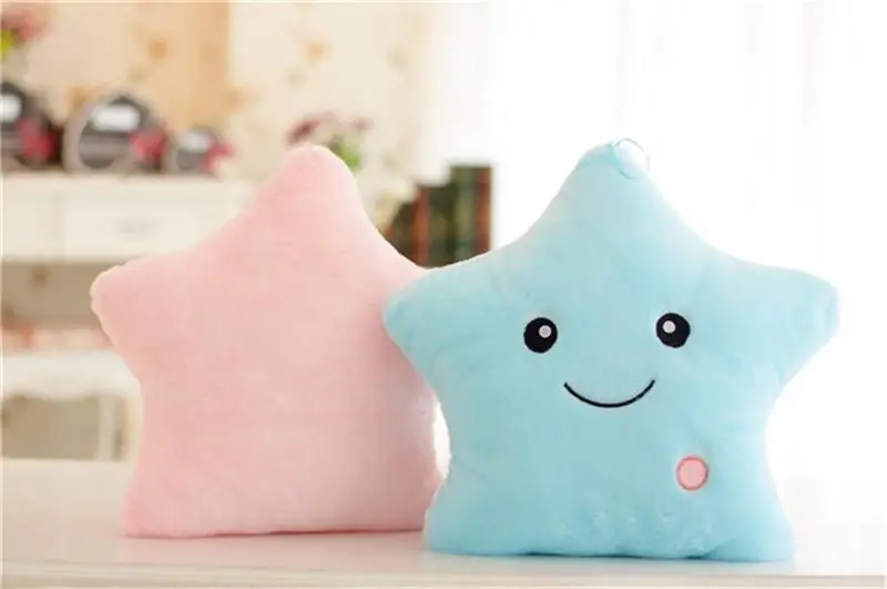 Soft, glowing plush pillow in the shape of a star, perfect for cuddling and providing a soothing nightlight for Kiwi kids