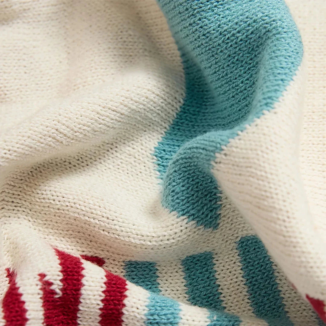 Cozy, colourful bohemian-style knitted cotton blanket perfect for home décor and outdoor use