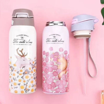 Stylish floral-patterned double-walled water bottle with straw, designed to keep drinks ice-cold for up to 12 hours in the warm New Zealand summer