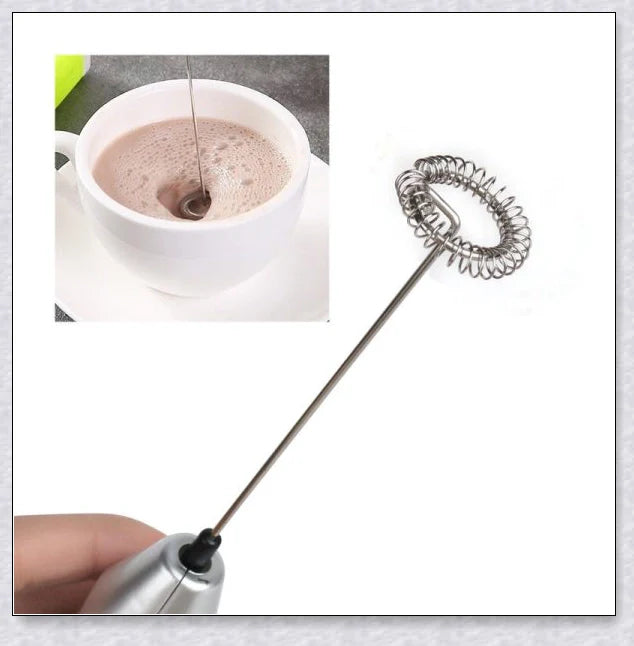 Compact, stainless steel milk frother with one-touch operation for creating cafe-style foam for coffee drinks