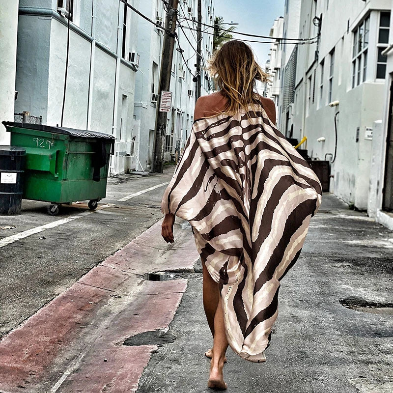 Stylish inclined shoulder printed dress set with a flowing, large swing-style skirt and vibrant patterns