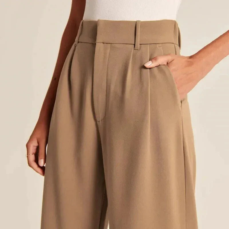 Elegant wide leg trousers for Kiwi women in a gray blue color, featuring a high-waist design and straight leg silhouette