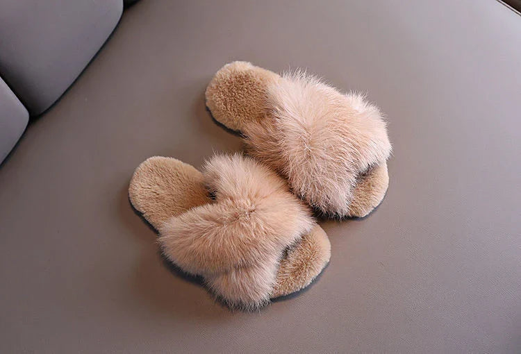 Stylish and comfortable cotton slippers with a unique cross-strap design and an eco-friendly rubber sole, available in a variety of Kiwi-inspired colours.