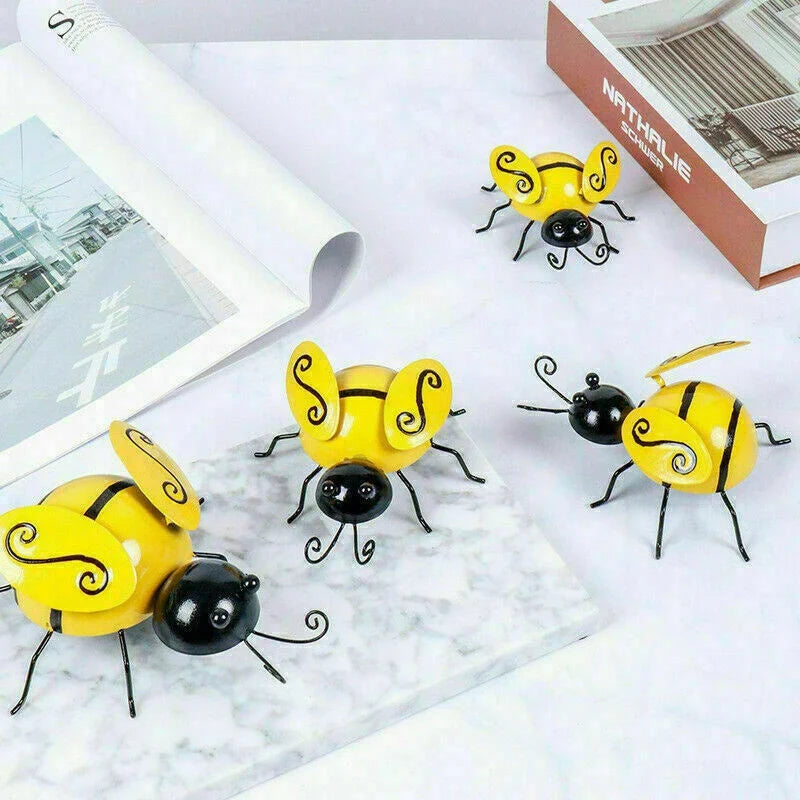 Decorative metal bumble bee garden ornament in a modern, nature-inspired design