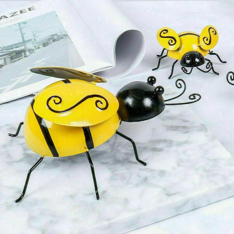 Decorative metal bumble bee garden ornament in a modern, nature-inspired design