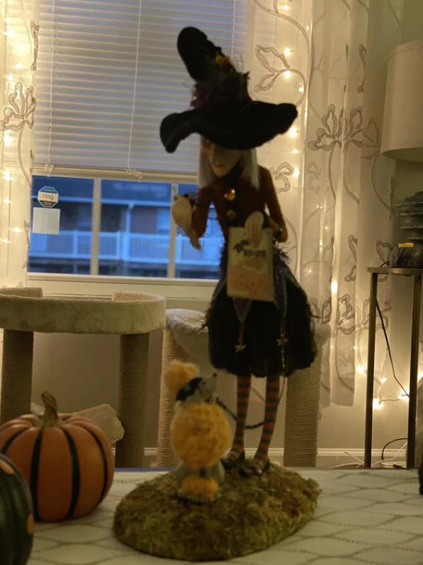 Enchanting Witch Figurine, a captivating tabletop decoration for Kiwi Halloween celebrations