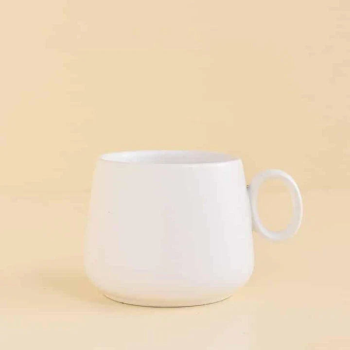 Pastel green ceramic coffee mug with a Kiwiana-inspired design, perfect for daily use in New Zealand homes and cafes.