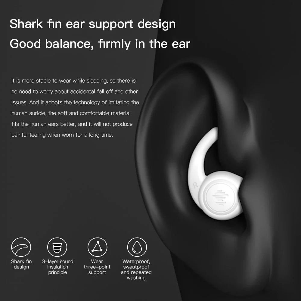 Pair of silicone ear plugs in black and white colors, designed for comfortable and effective noise reduction during sleep