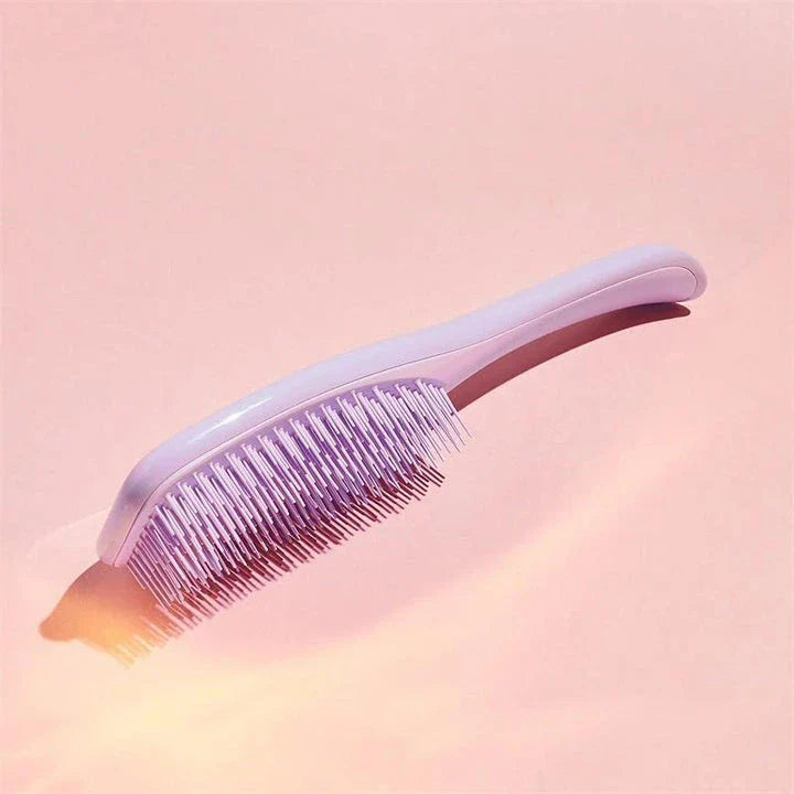 Anti-static hairbrush with soft bristles for detangling and styling hair effortlessly