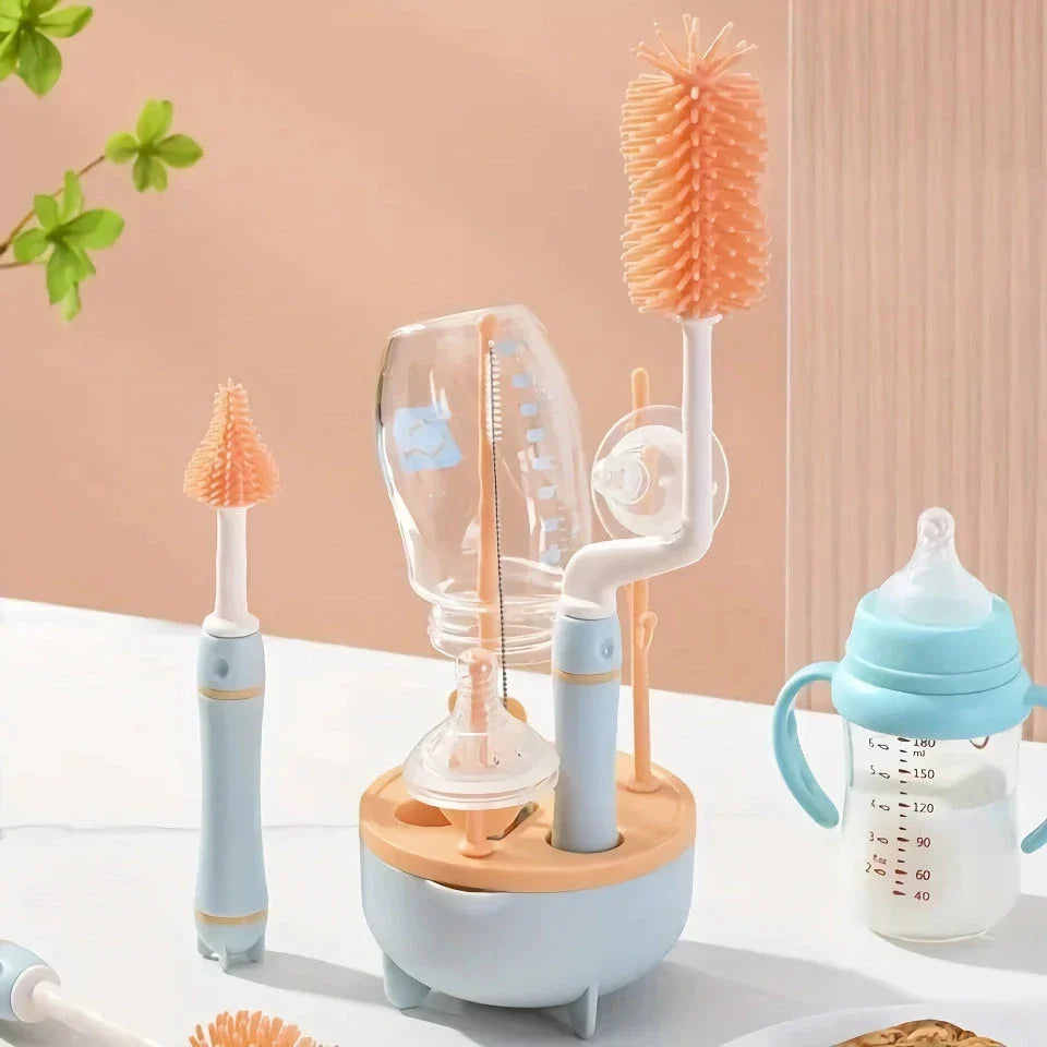 A 360-degree rotating silicone bottle brush with a long handle and a drying rack for cleaning and drying baby bottles and other feeding essentials.