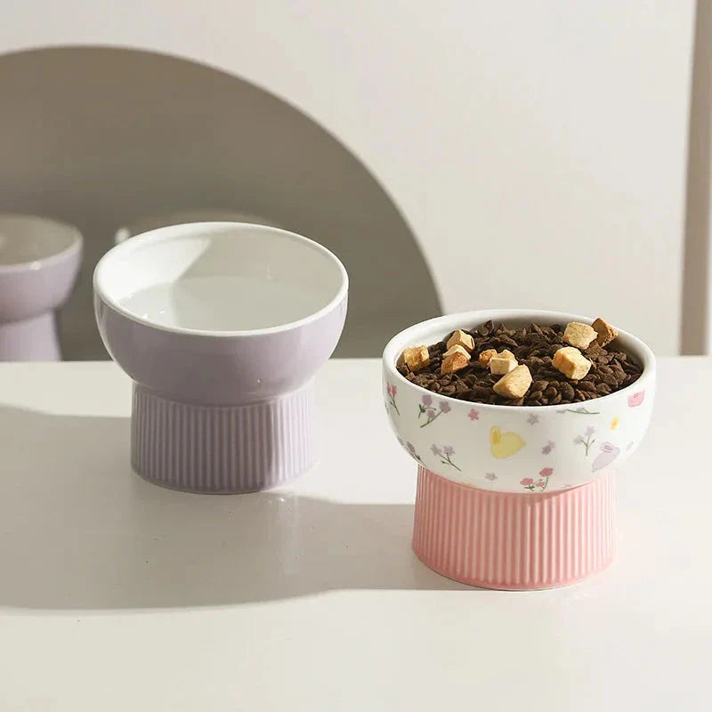 Ceramic pet water bowl with a rounded shape and sleek pink finish, designed to provide a comfortable and healthy drinking experience for cats and small dogs.