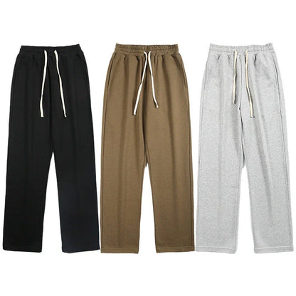 Straight gray sweatpants with a chic draping effect, perfect for Kiwi casual fashion