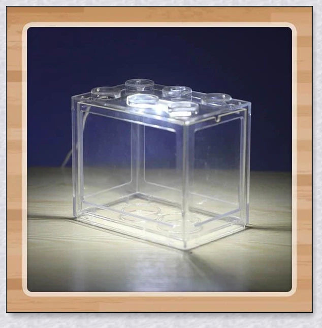 Stackable InspireHOME Mini Block Aquarium with LED lighting, showcasing various color options and configuration possibilities